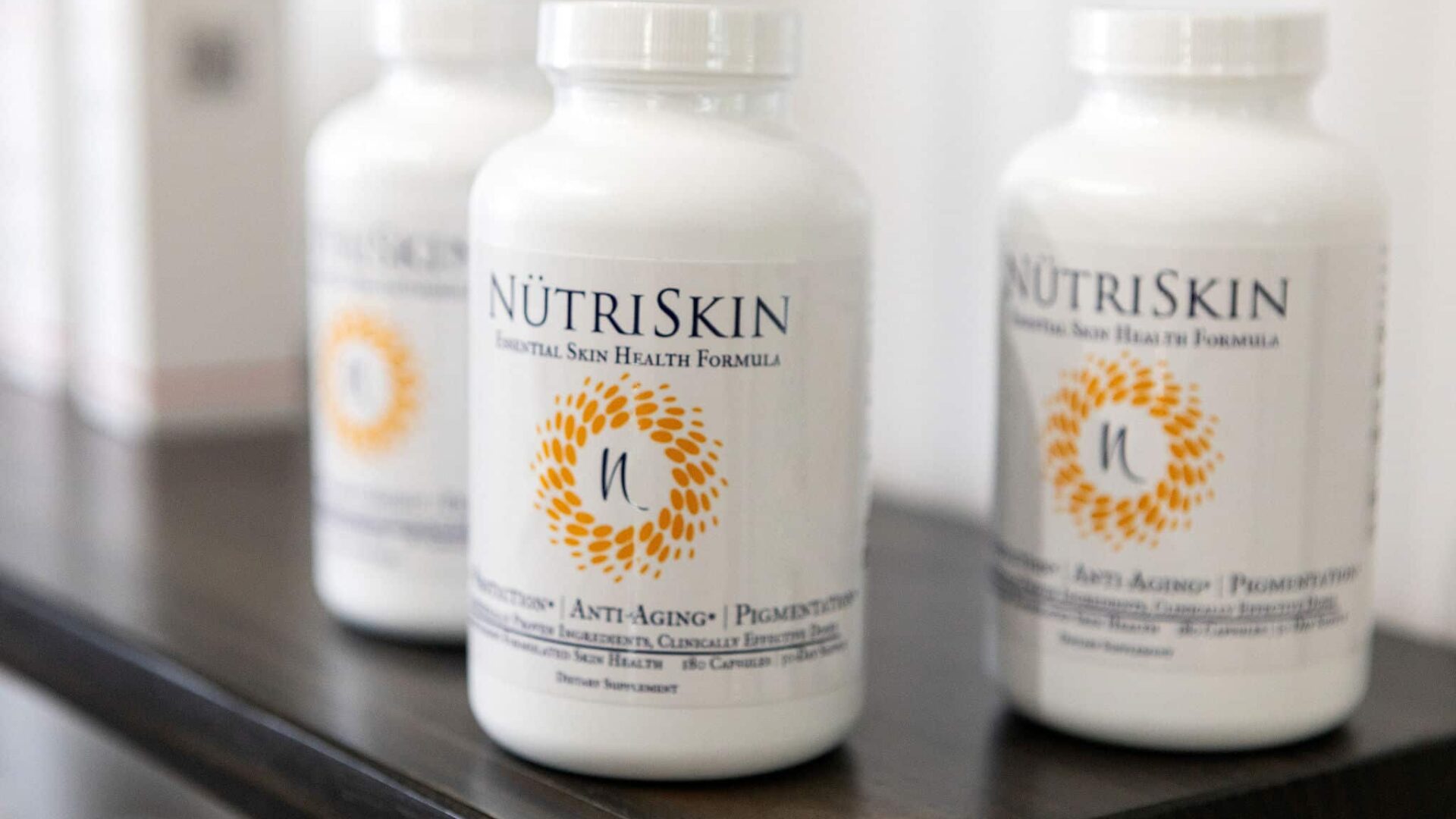 NutriSkin supplements on a shelf, promoting skin health.