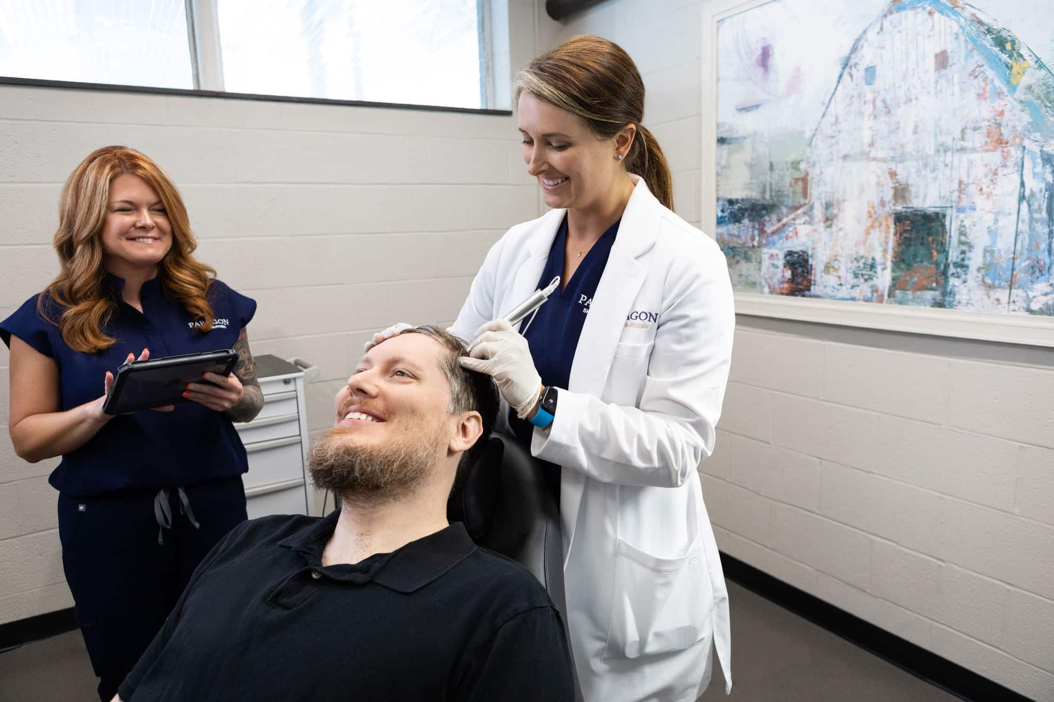 f-8890 Dermatologist treating patient in clinic for skin procedure.