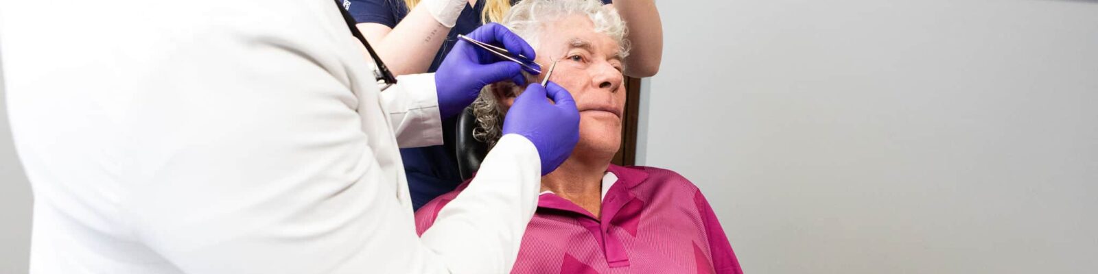 mohs-surgery Doctor performing Mohs surgery on a patient's skin