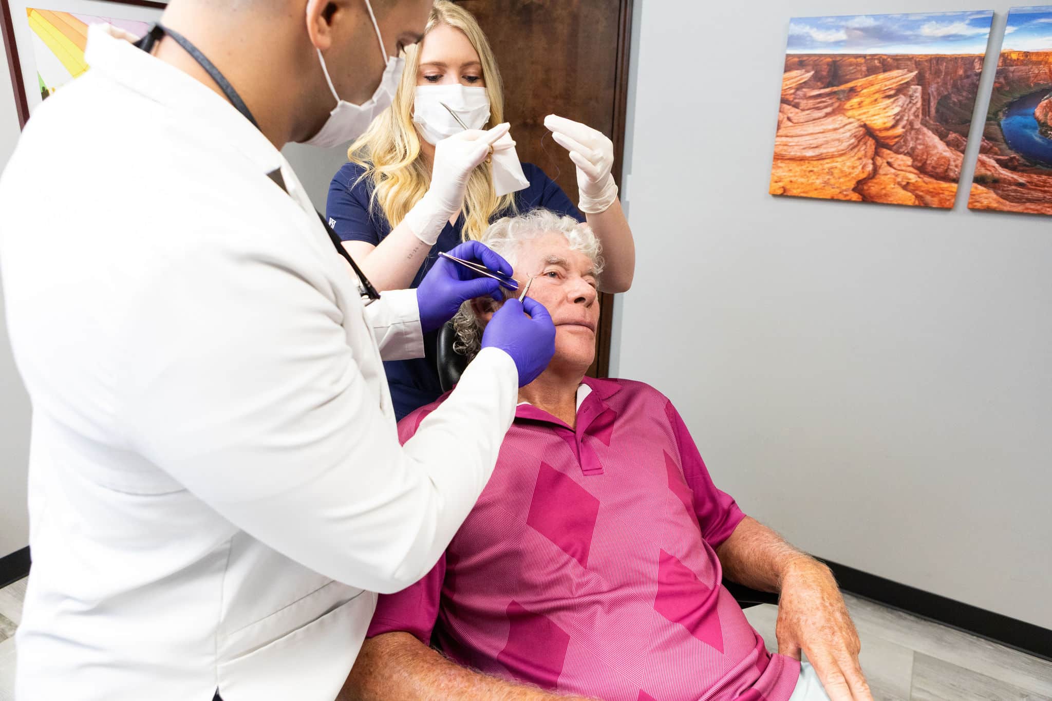 mohs-surgery Doctor performing Mohs surgery on a patient's skin